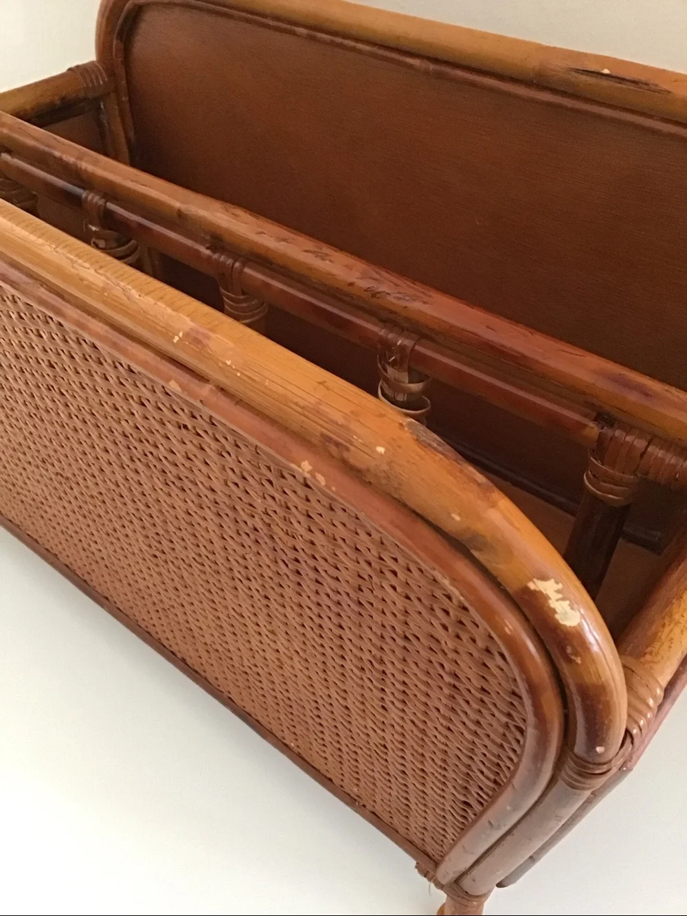 Vintage 1950s magazine rack bent bamboo frame, woven rattan side