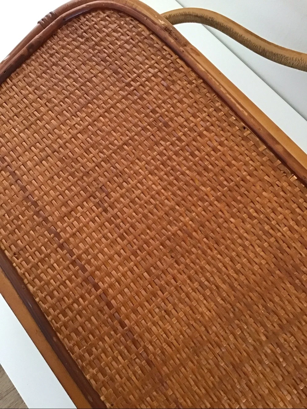 Vintage 1950s magazine rack bent bamboo frame, woven rattan side