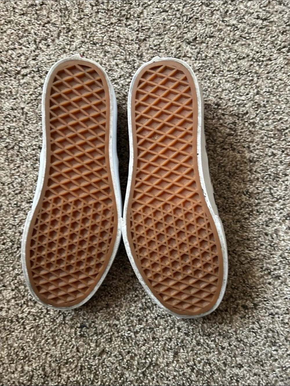 Vans Black and White Checkerboard Slip-On Sneakers