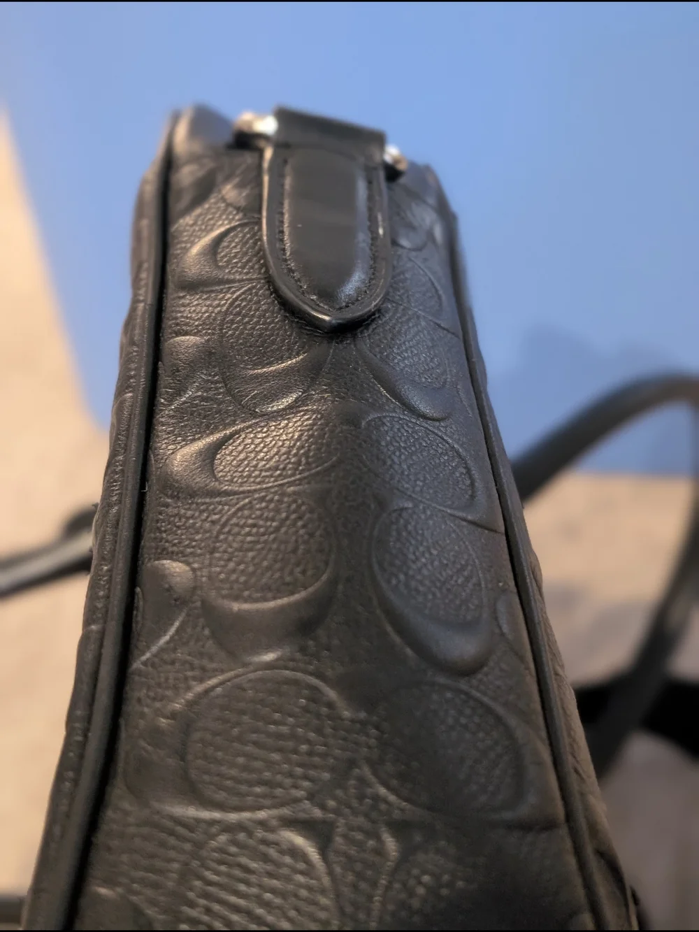 Coach sleek black