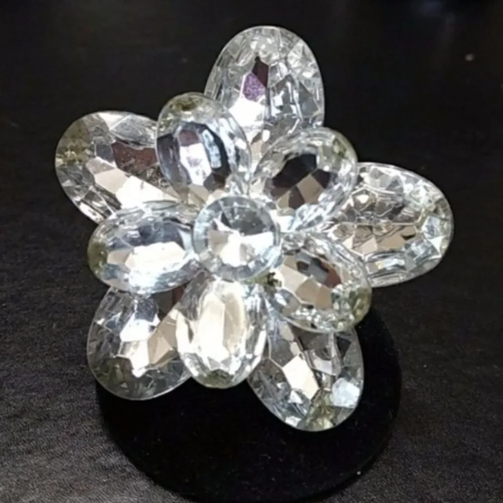 Silver tone sparkly flower bling ring