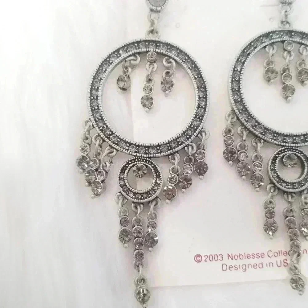 Silver dangling circle earrings