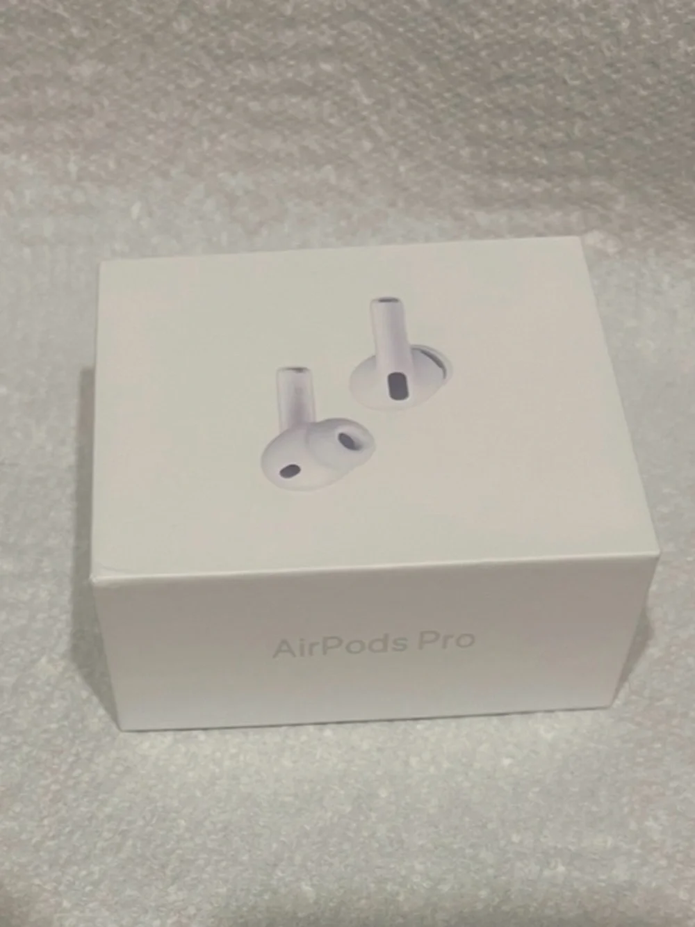 Apple earbuds included