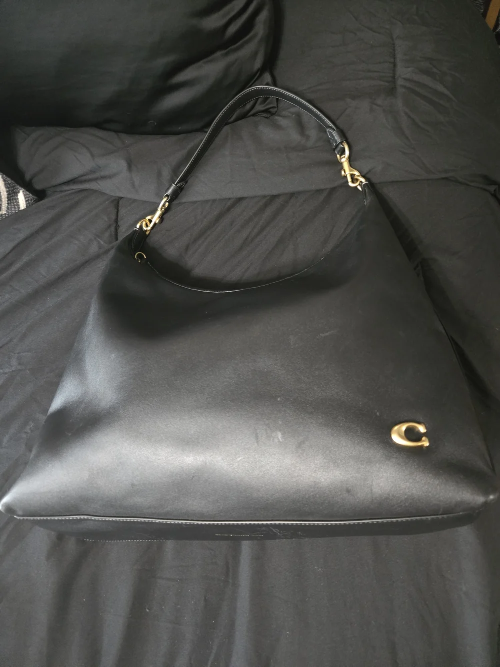Coach sleek black