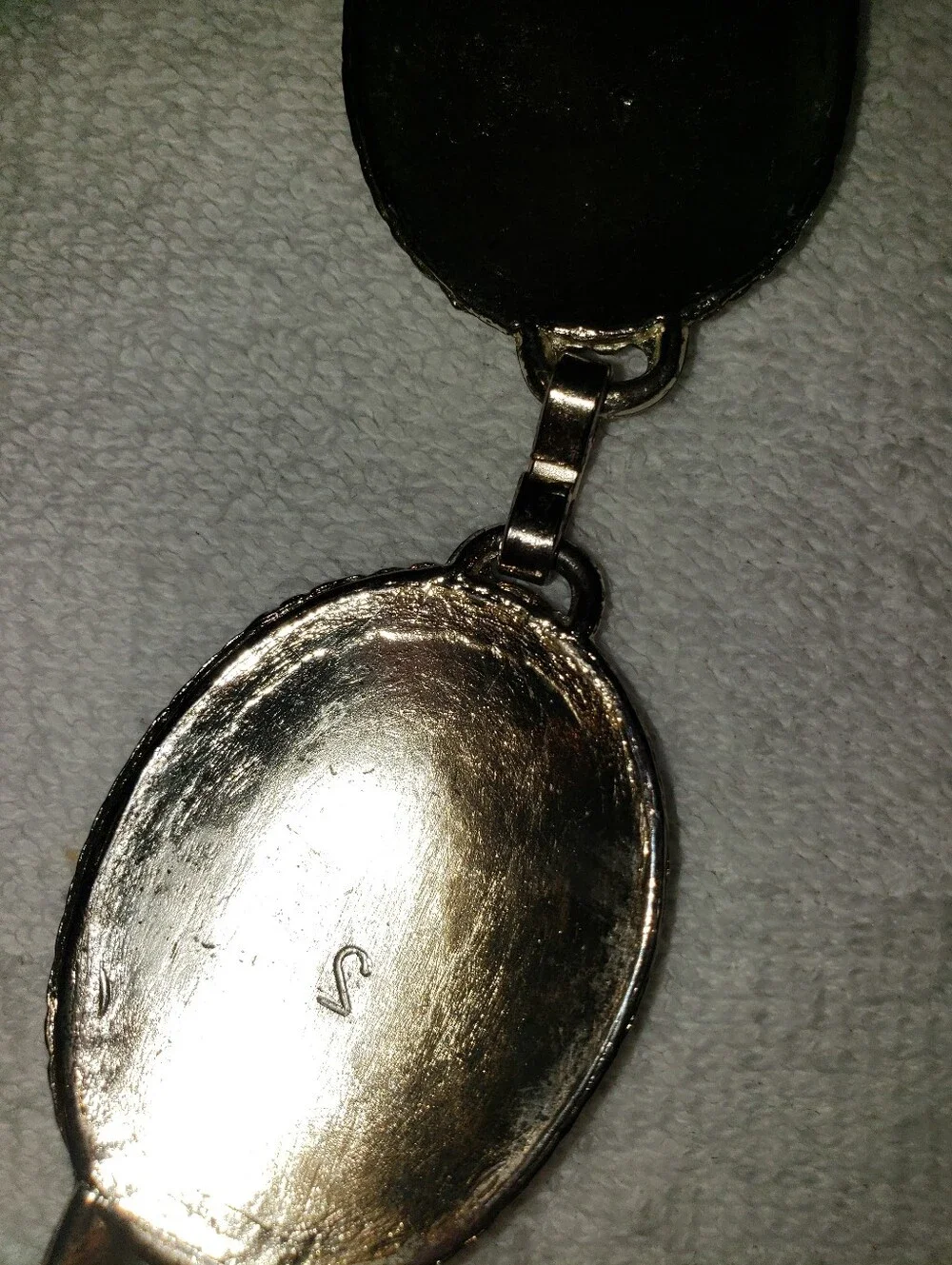 Tony Lama silver oval