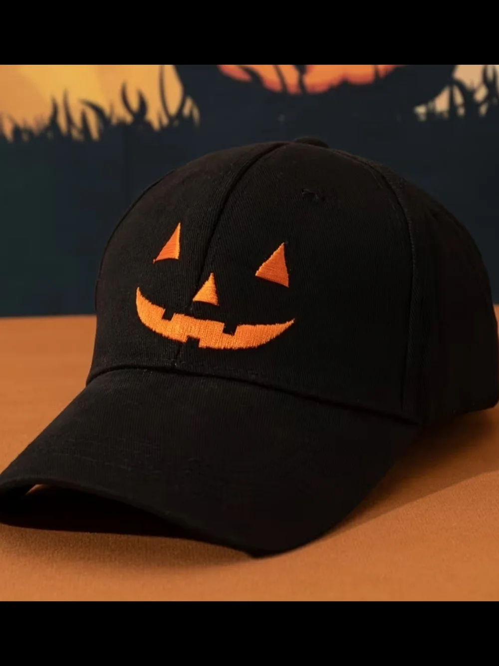 Black Baseball Hat with Orange Jack-O'-Lantern Embroidery