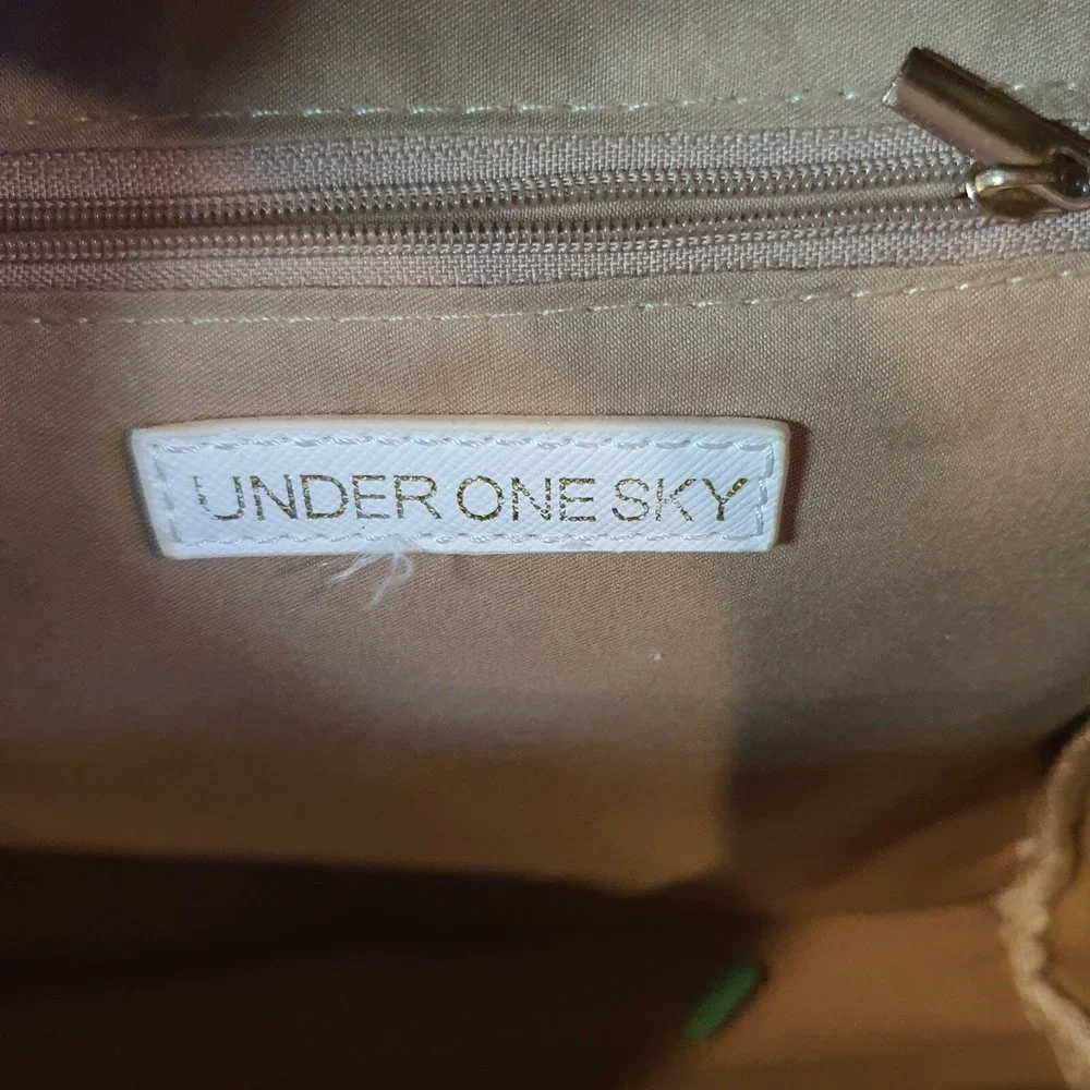 Under One Sky pre owned