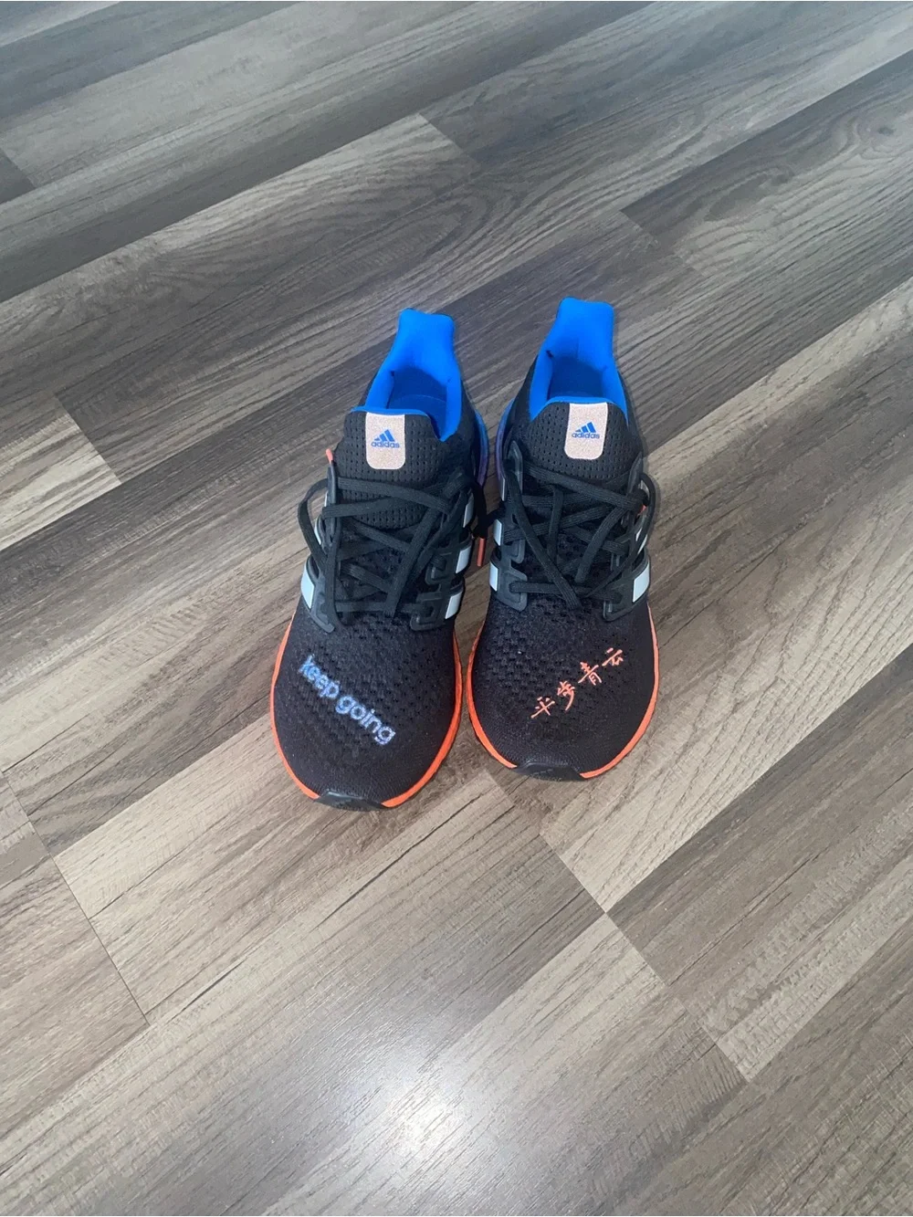 adidas Ultraboost men/women KEEP GOING Black Sneakers Blue and Orange Accents