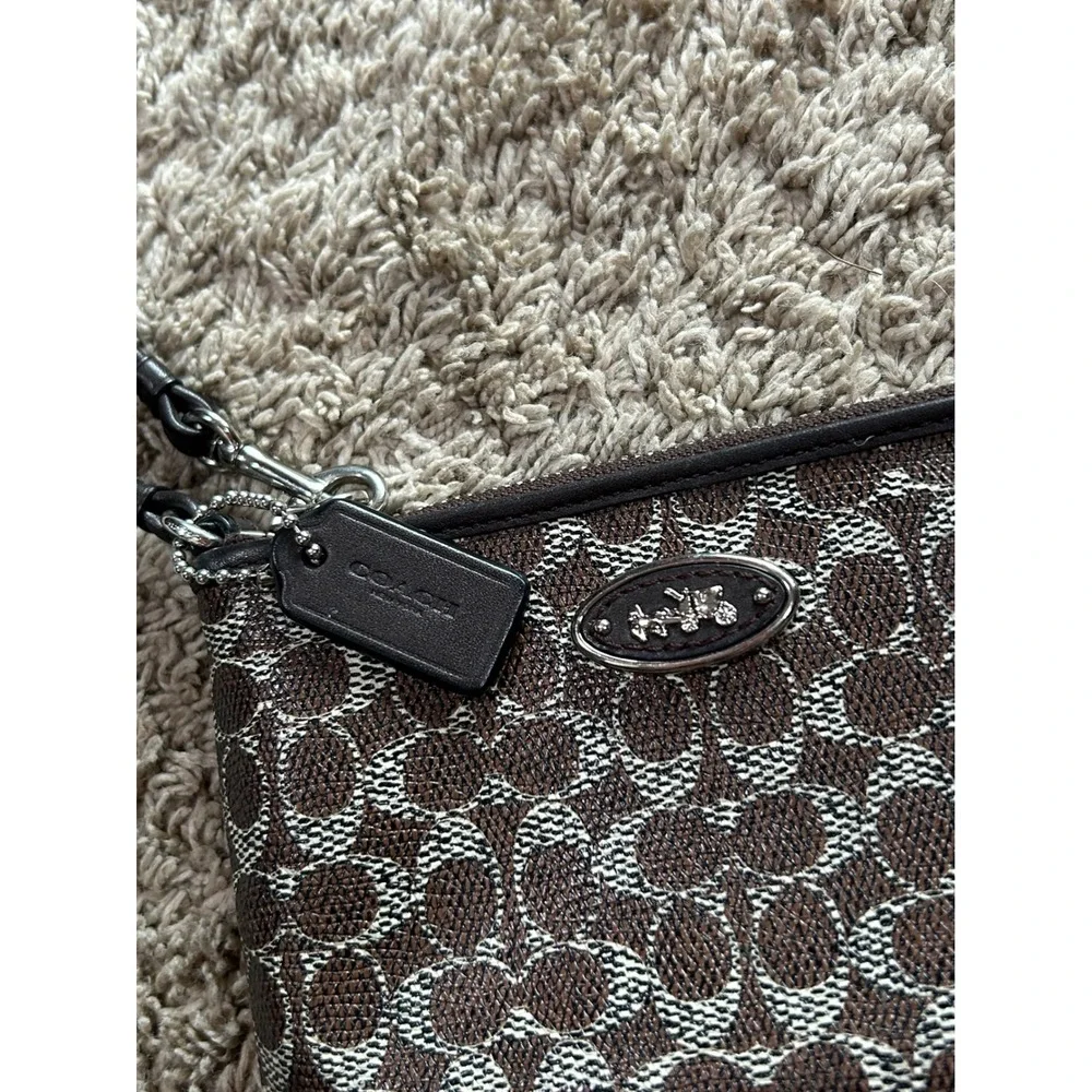 Coach wristlet features
