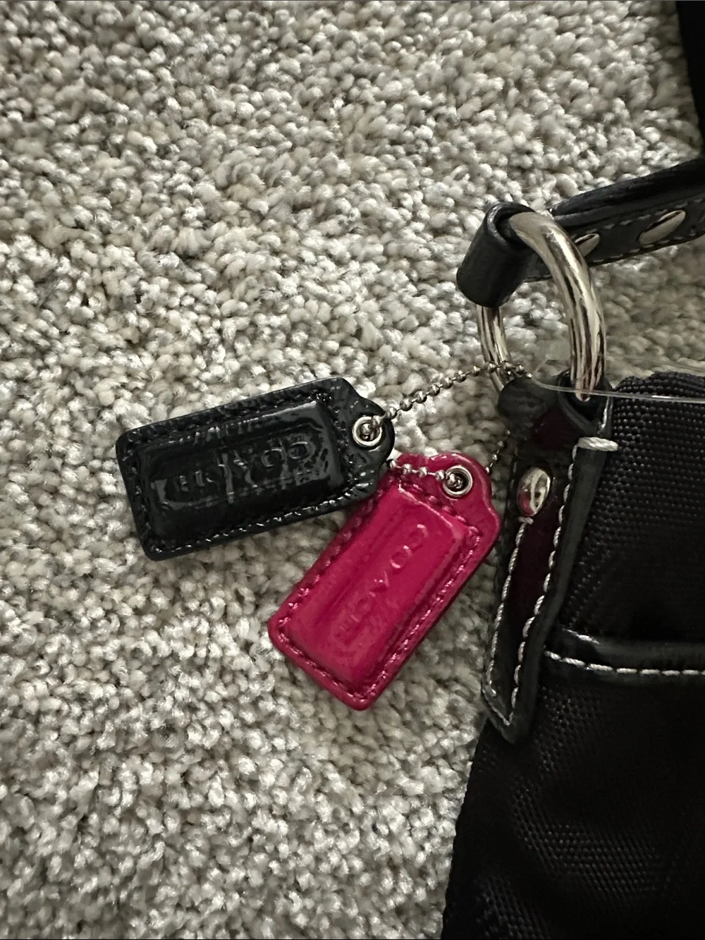 Coach sleek black