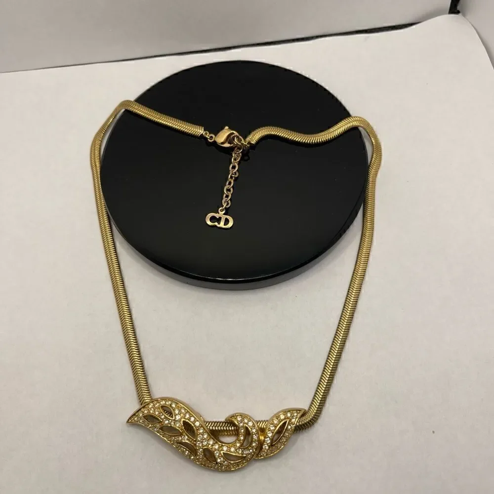 Real Christian Dior gold tone necklace rhinestone pendant