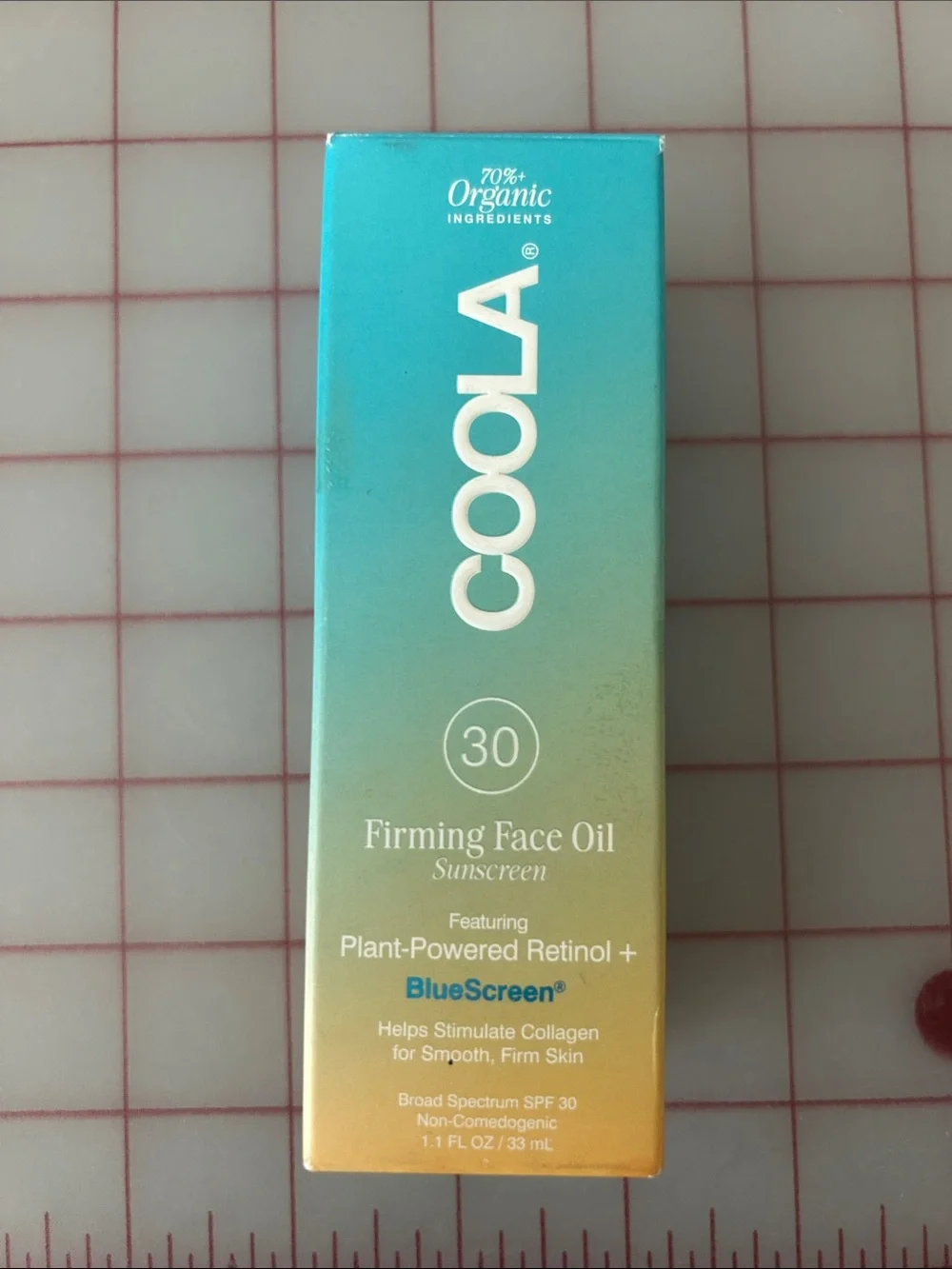 COOLA Firming Face Oil Sunscreen - Teal to Gold Gradient
