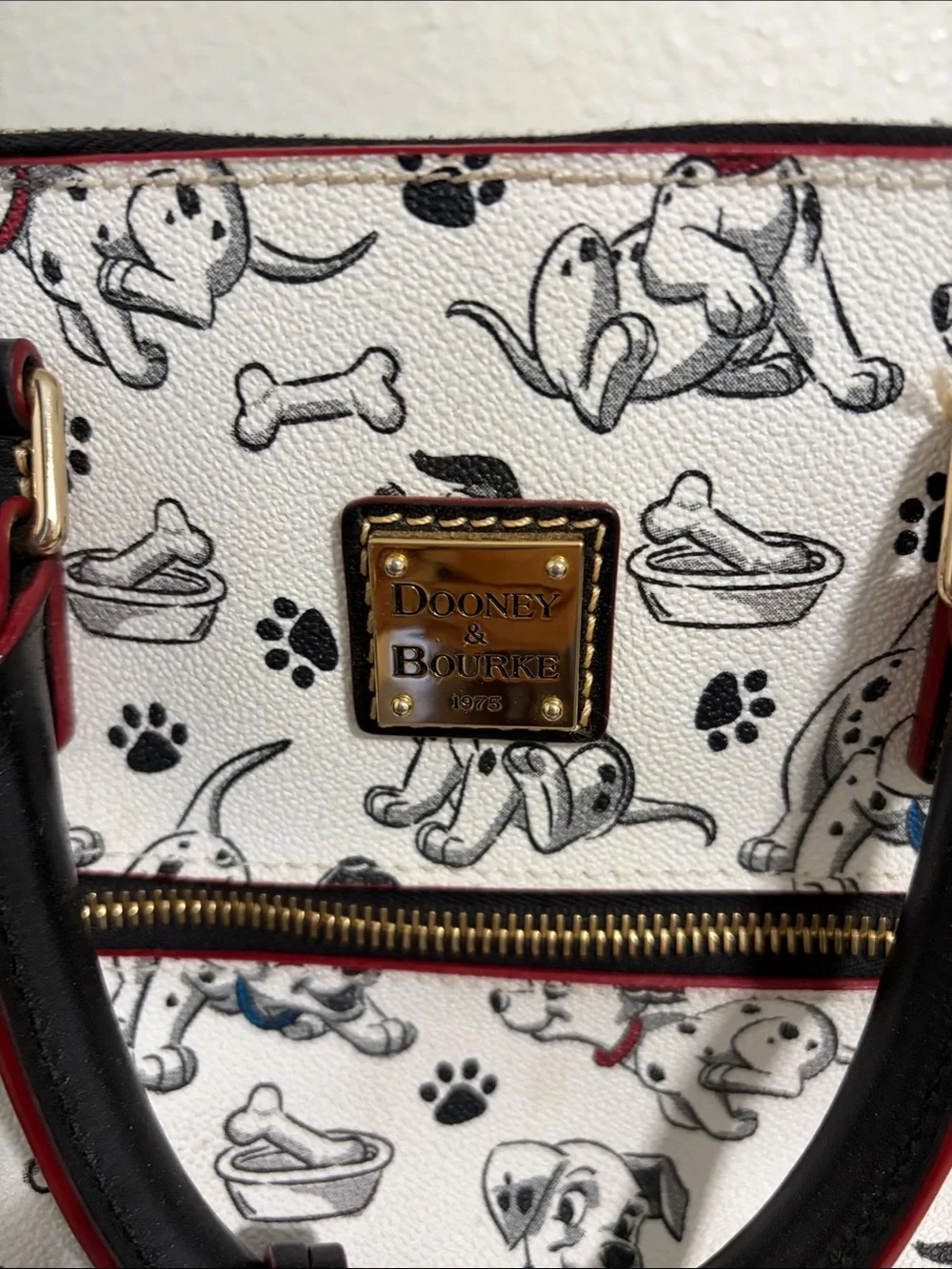 Dooney & Bourke reposhing this