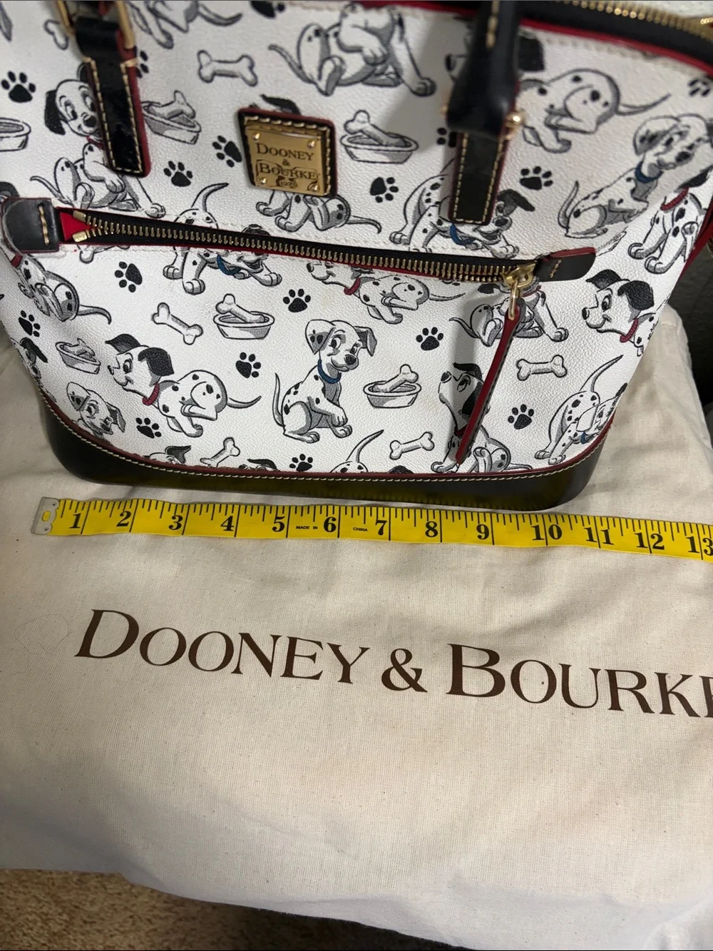 Dooney & Bourke reposhing this