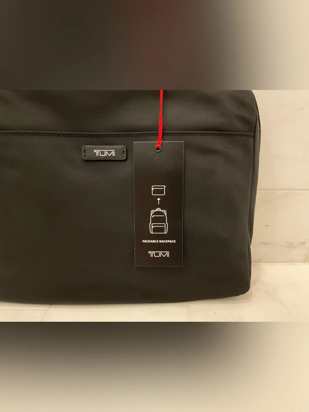 Tumi up sale