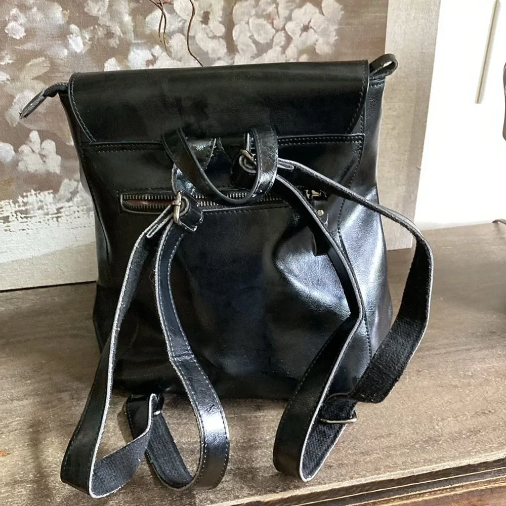 Heshe black leather