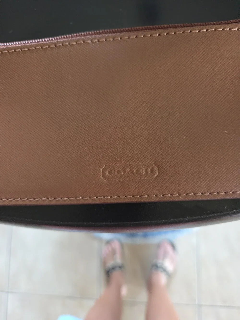 Coach slim zip
