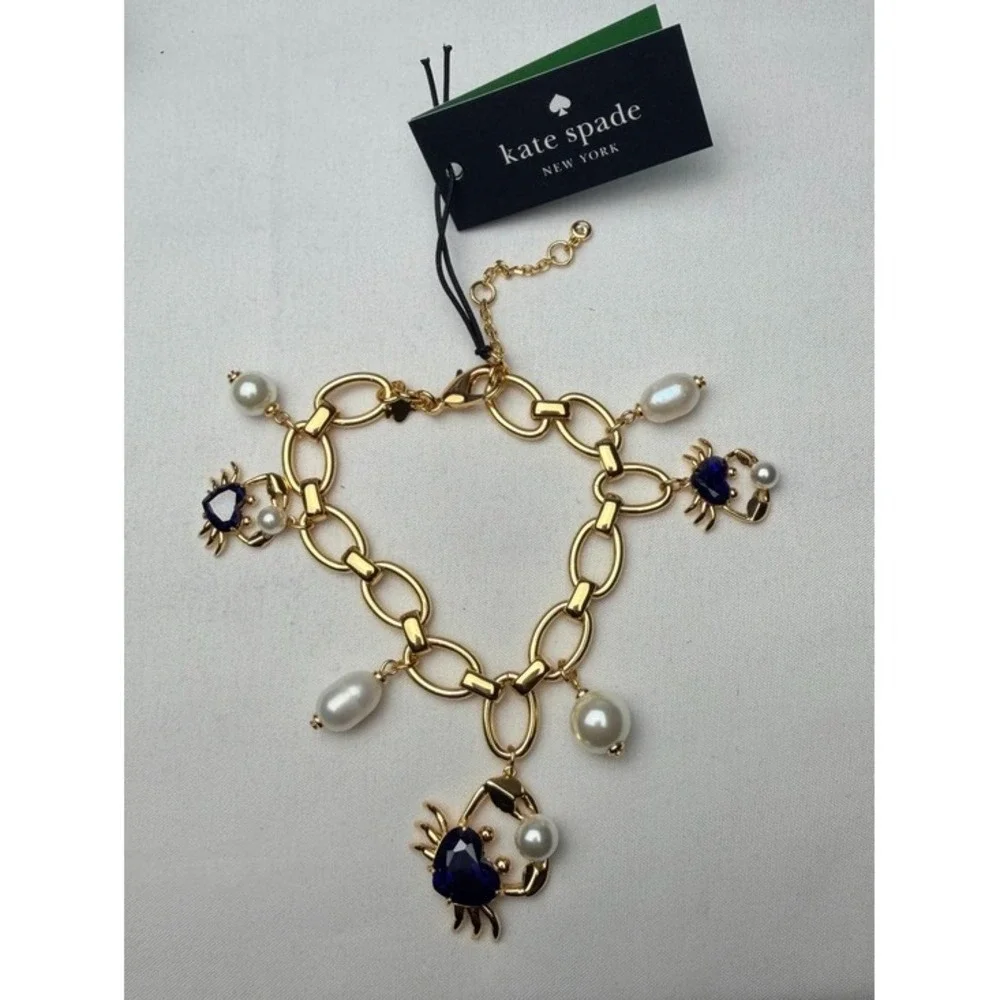 Kate‎ Spade claw out Gold Chain Bracelet with Blue Crystal & Pearl Charm