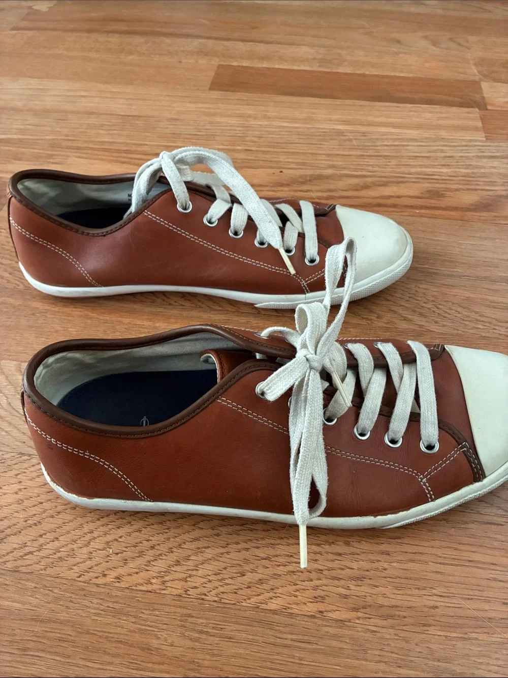 Cole Haan features pair