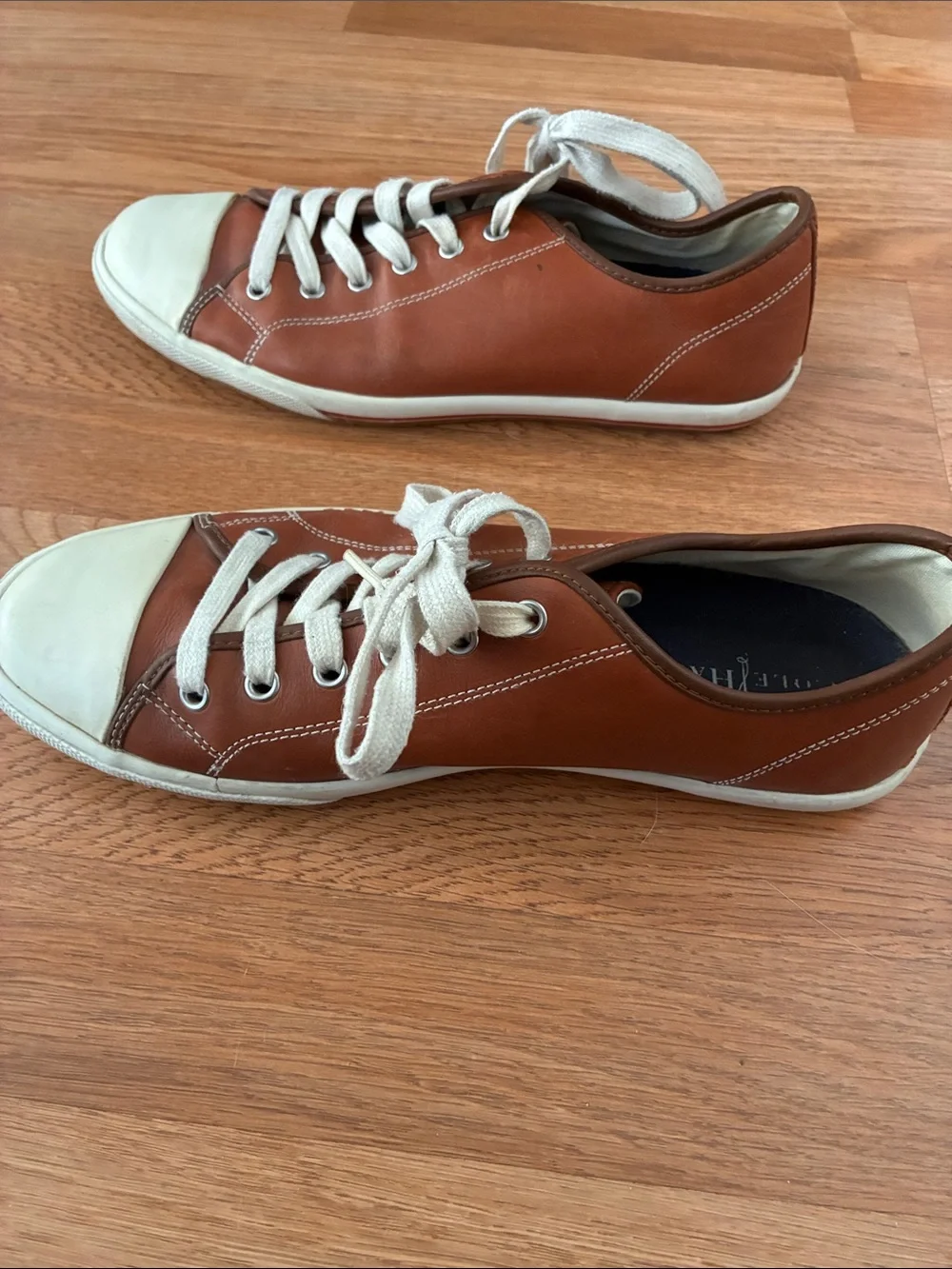 Cole Haan features pair