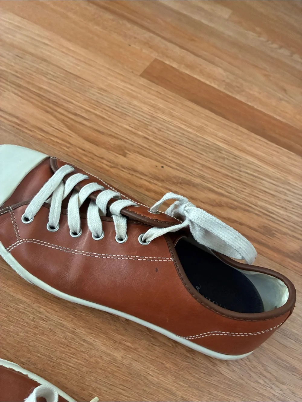 Cole Haan features pair