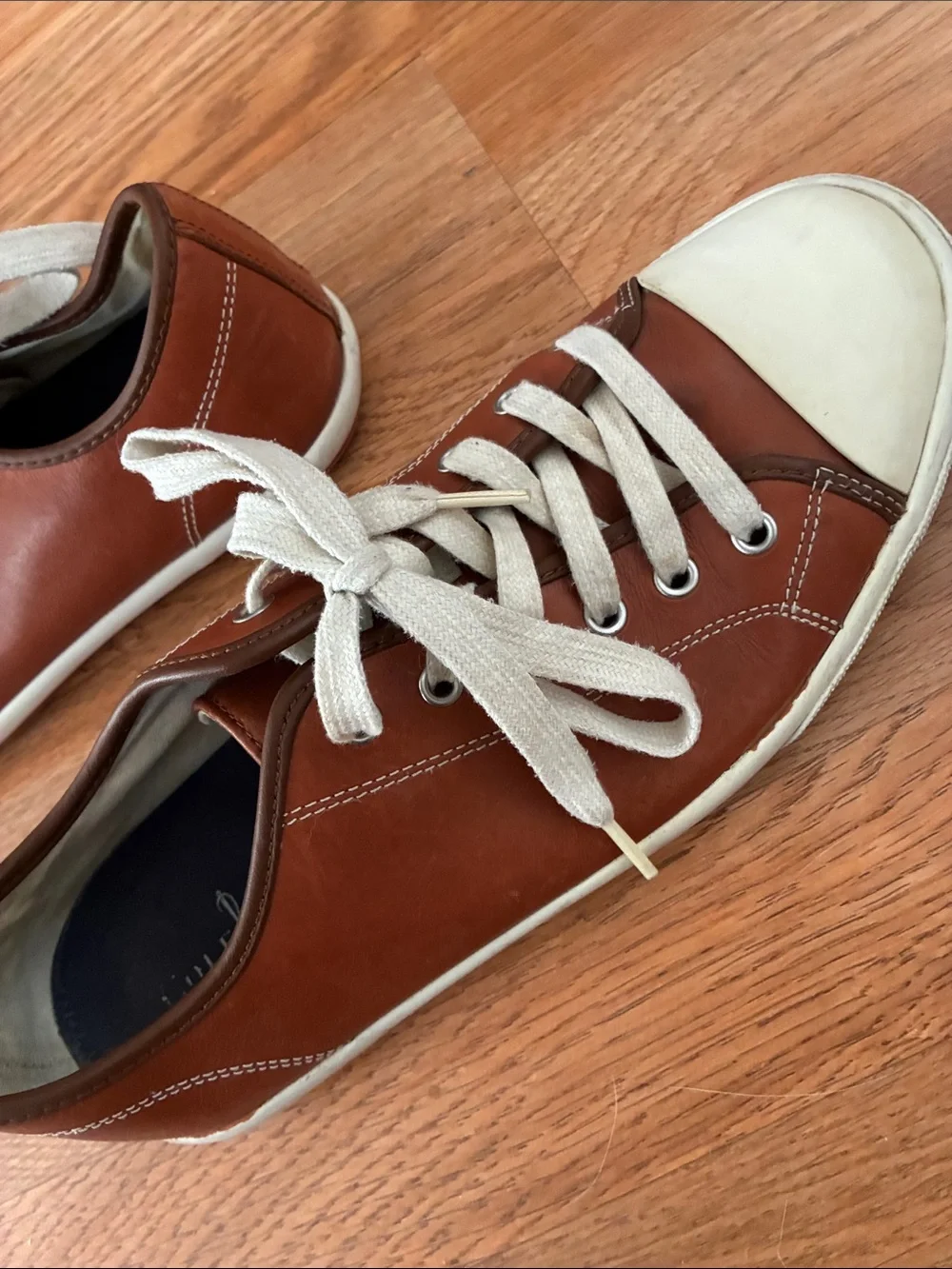 Cole Haan features pair