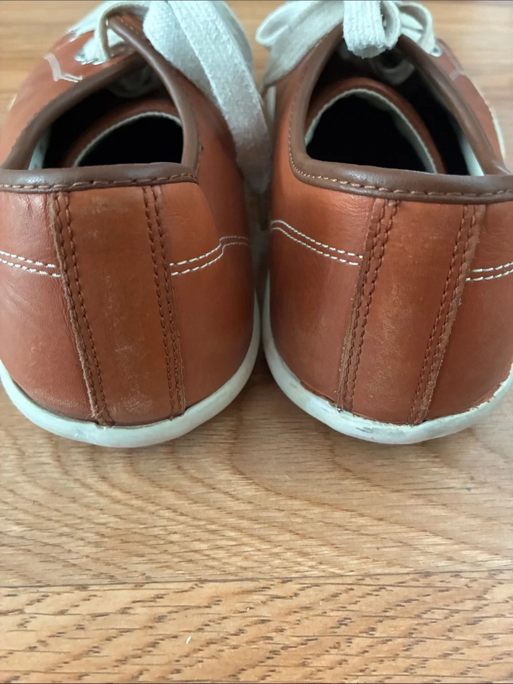 Cole Haan features pair