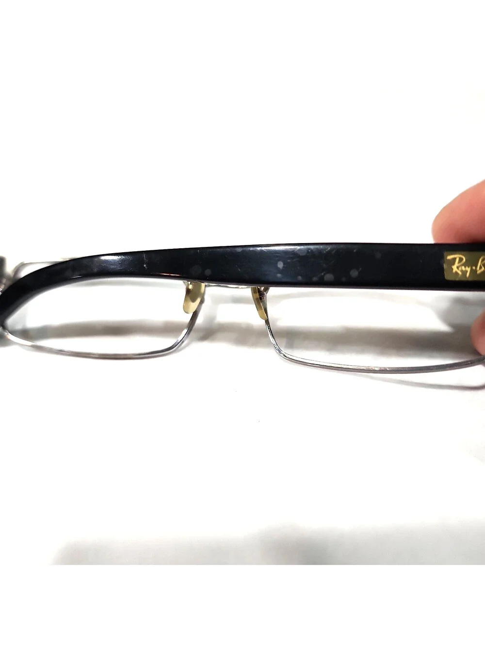 Ray-Ban **selling as