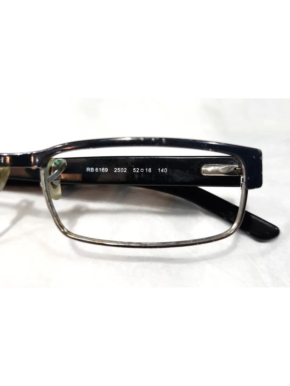 Ray-Ban **selling as