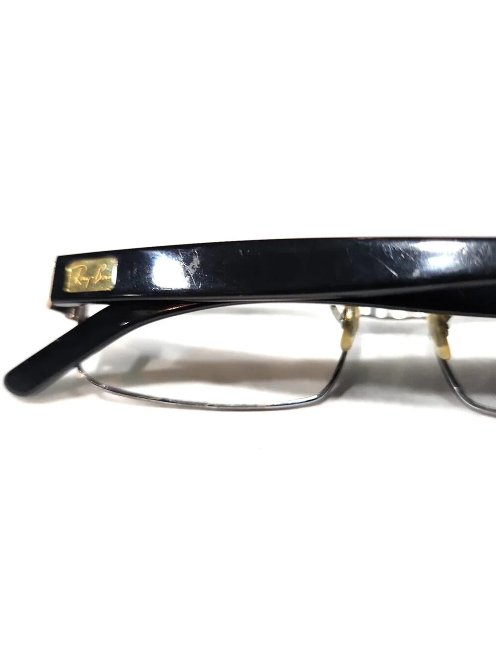 Ray-Ban **selling as