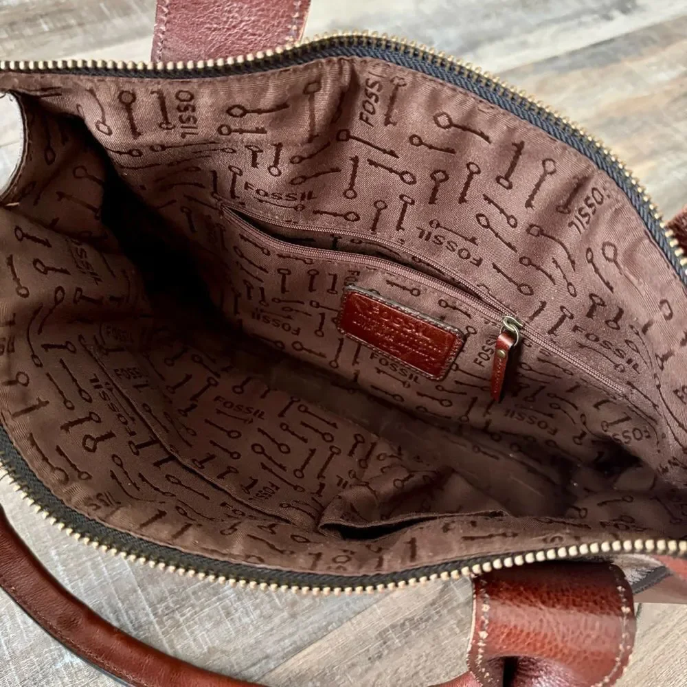 Fossil satchel combines