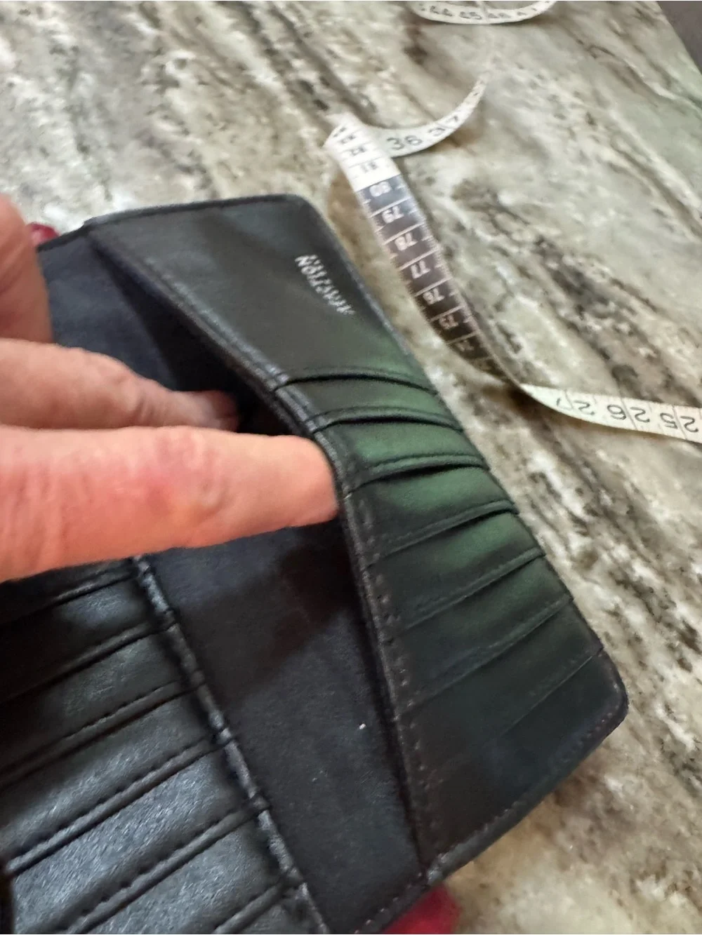 Kenneth Cole sleek leather