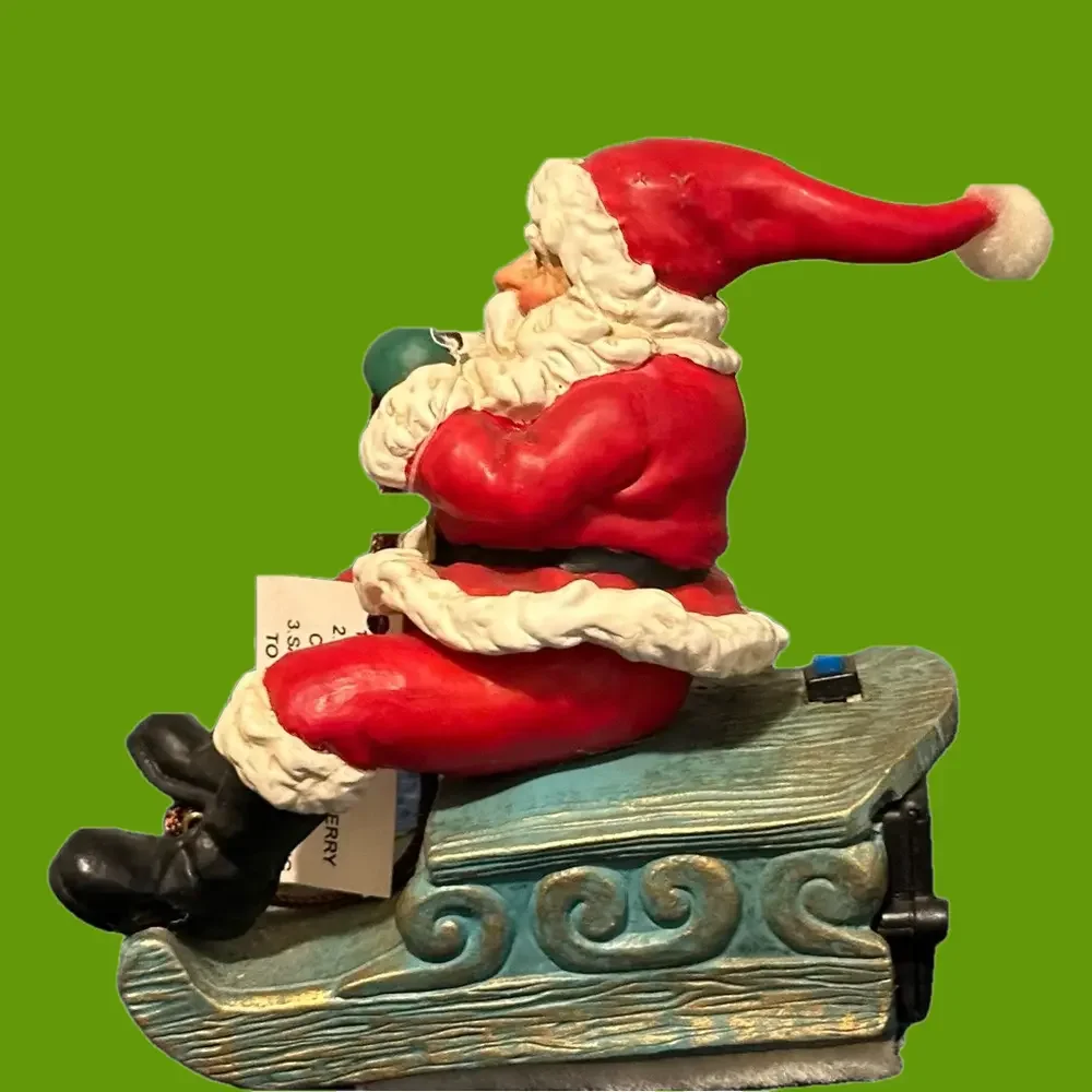Musical vibrating Santa on his sleigh. Plays 3 songs!