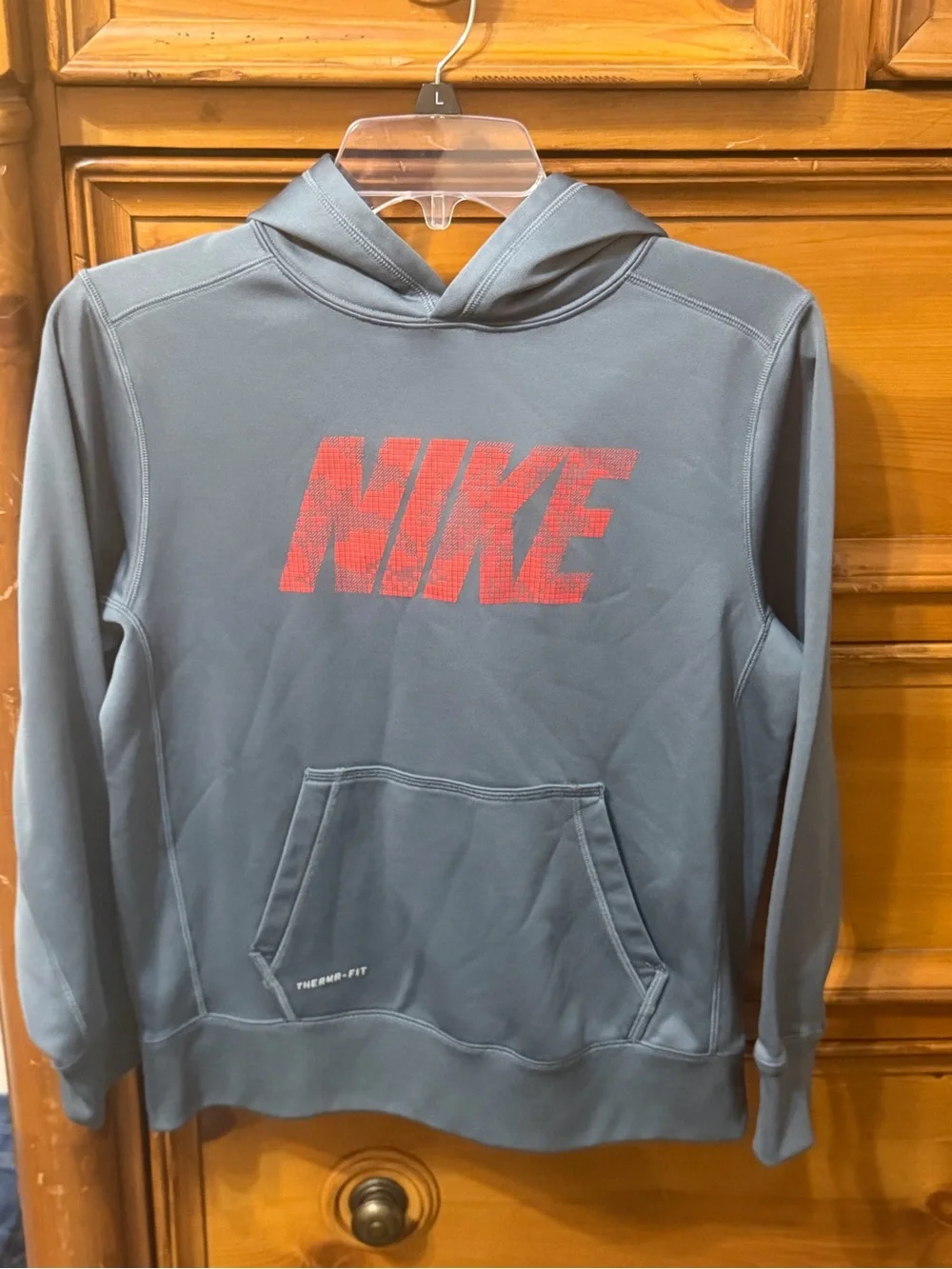Youth Nike Blue Hooded Sweatshirt with Red Logo