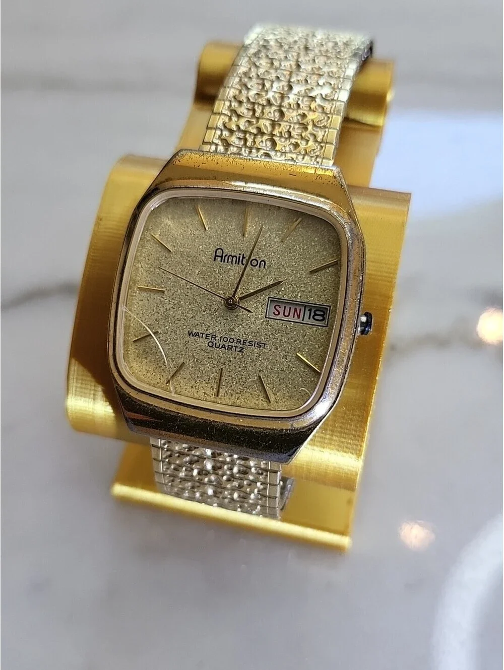 Armitron Men’s Watch Dust Gold Tone TankDate DayDial Nugget Band New Batt. 31mm