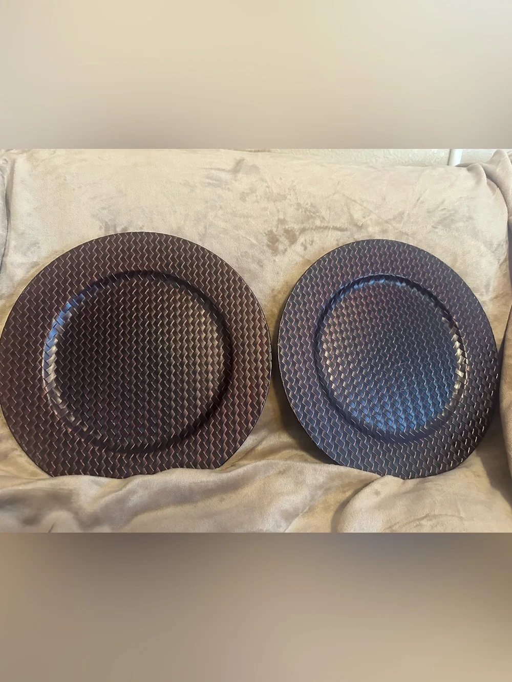 Set of 2 metallic brown plate chargers.