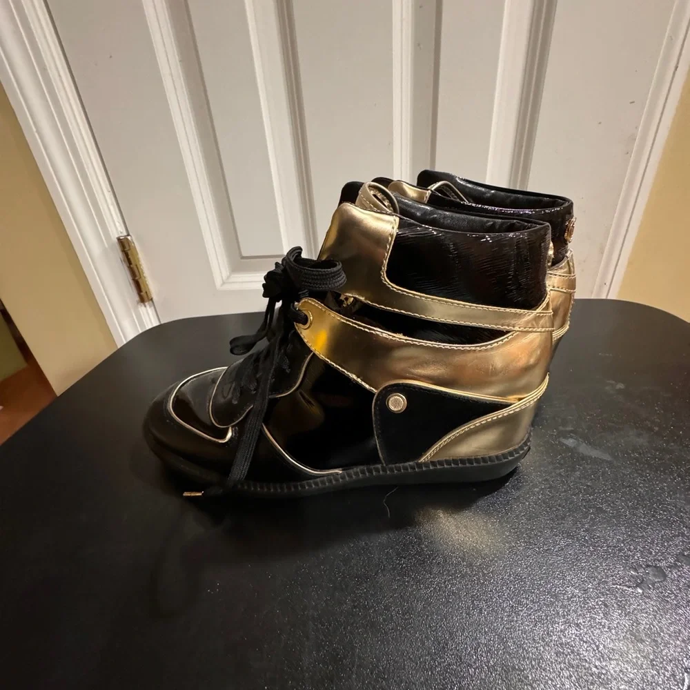 Michael Kors  size 8.5 Nikki black and gold high top sneakers