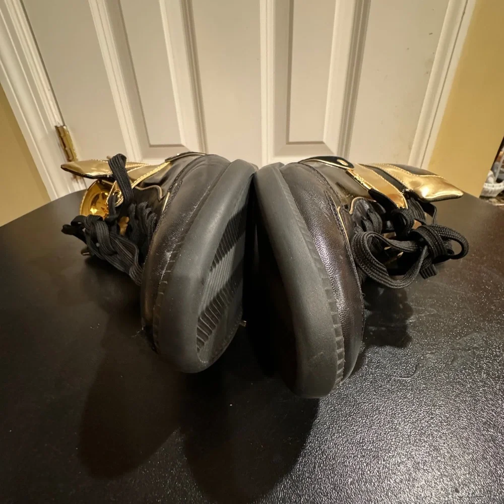 Michael Kors  size 8.5 Nikki black and gold high top sneakers