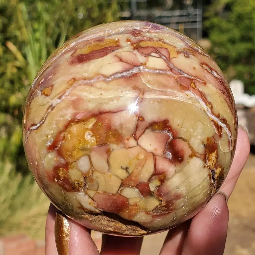 Pink Ocean Ibis Jasper Brecciated Sphere w/ Caves Druzy 458 grams 71mm