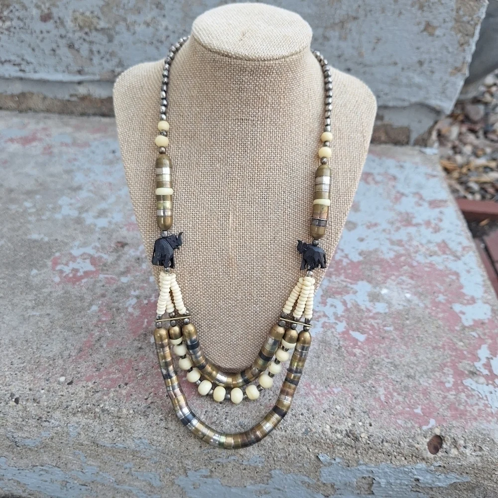 Elegant Beaded Necklace with Elephant Accents