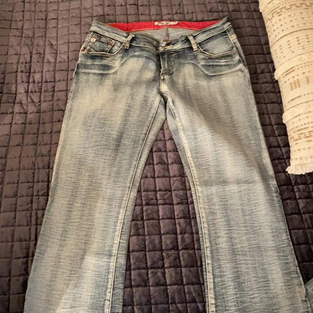 Indigo red washed‎ faded bootcut jeans