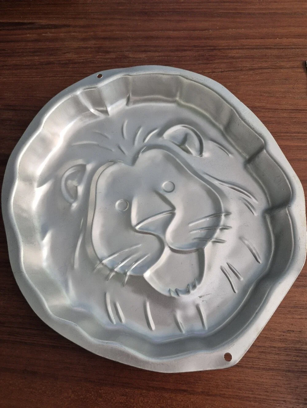 Wilton cake construction stamped