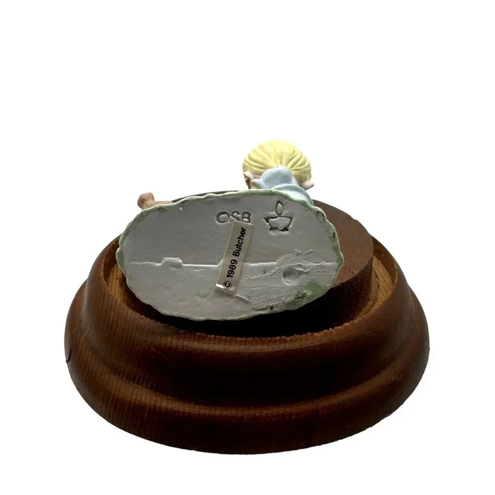 PMI this figurine
