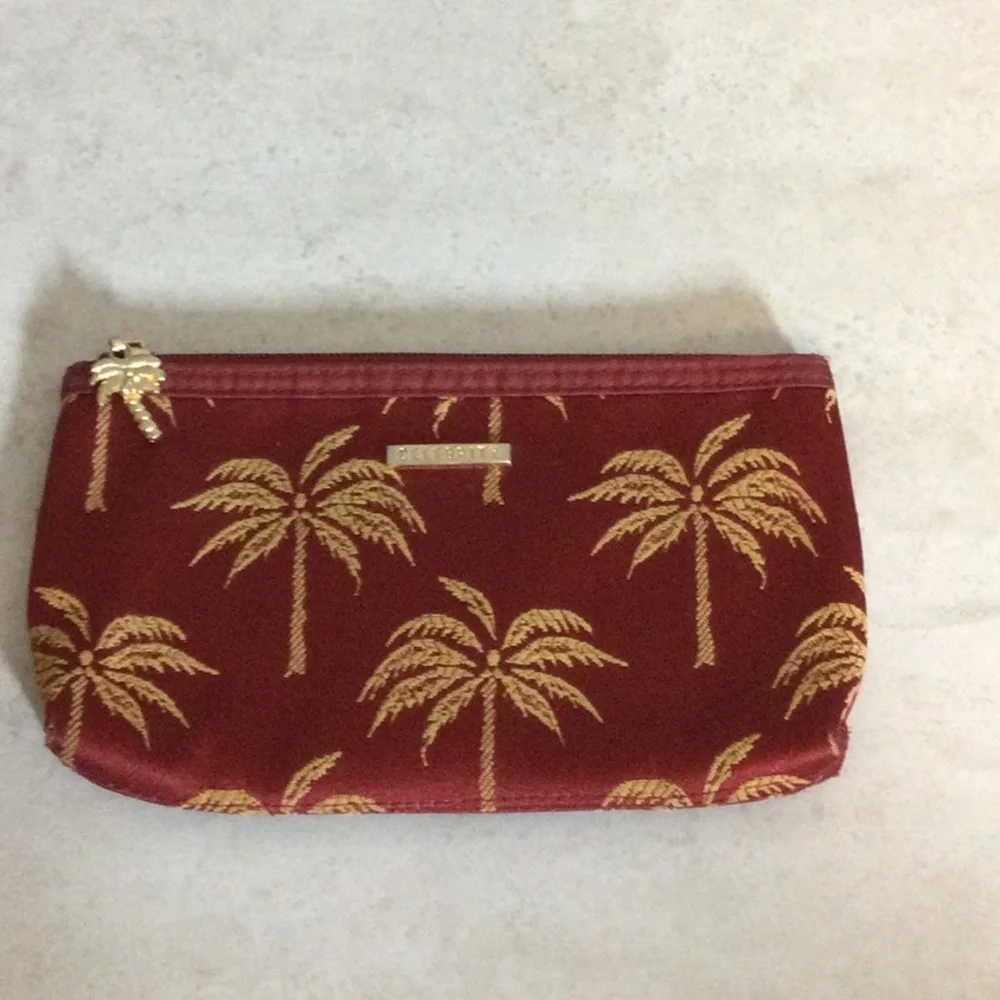 Celebrity Gold Palm-Print Pouch in Burgundy