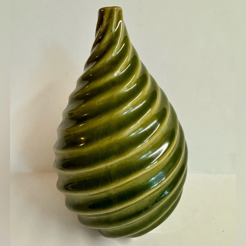 Vintage MCM pottery in earthy sage green  swirl vase.Has crazing.