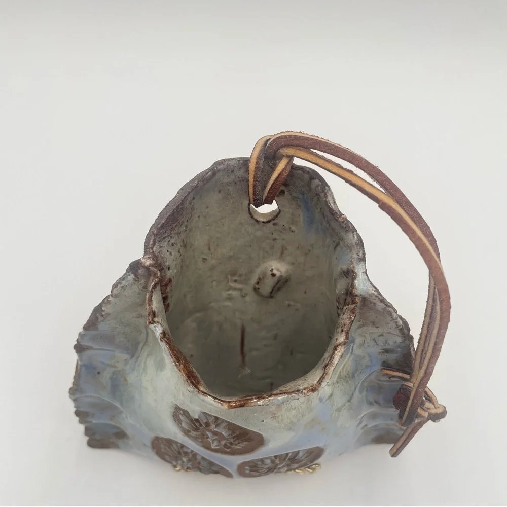 Hand Crafted fired plant self