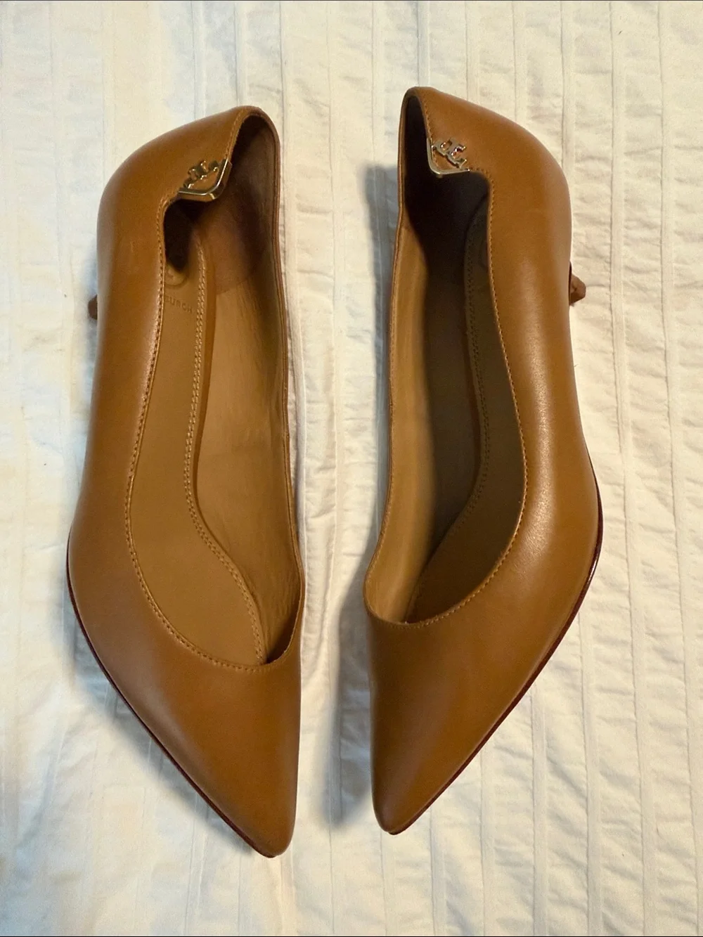 Tory Burch accent leather scratches