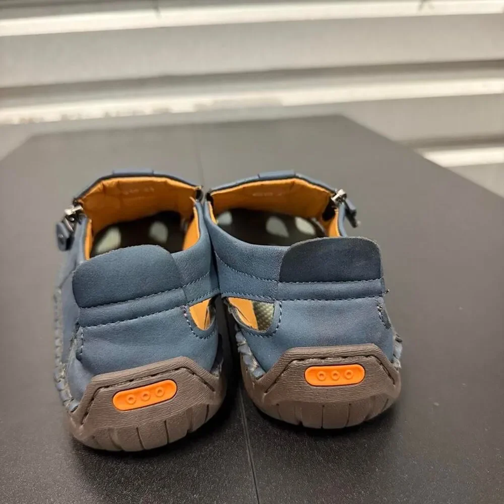 Source Unknown accents blue leather