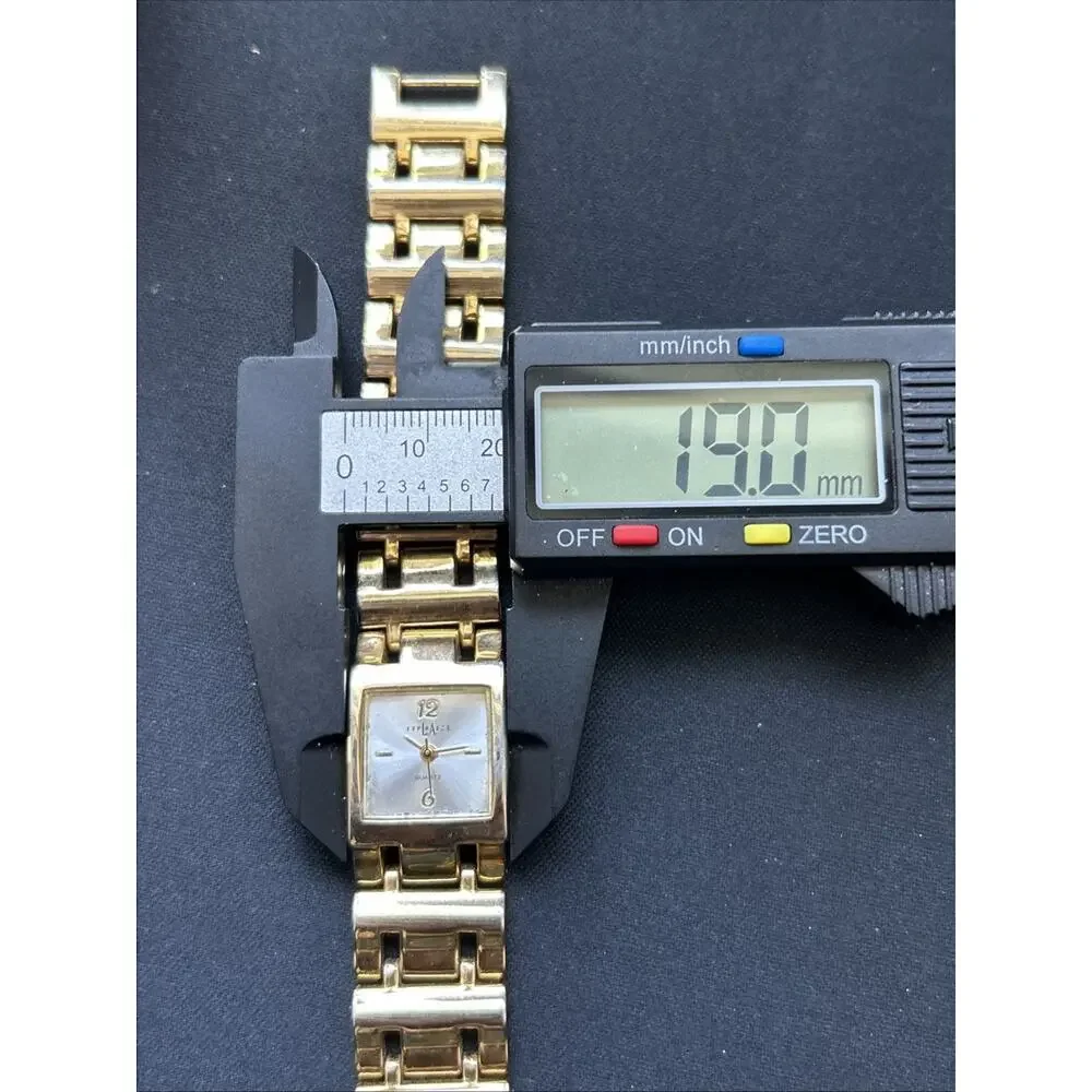 LA Express Silver Tone Dial Gold Tone Case And Band Women’s Quartz Watch