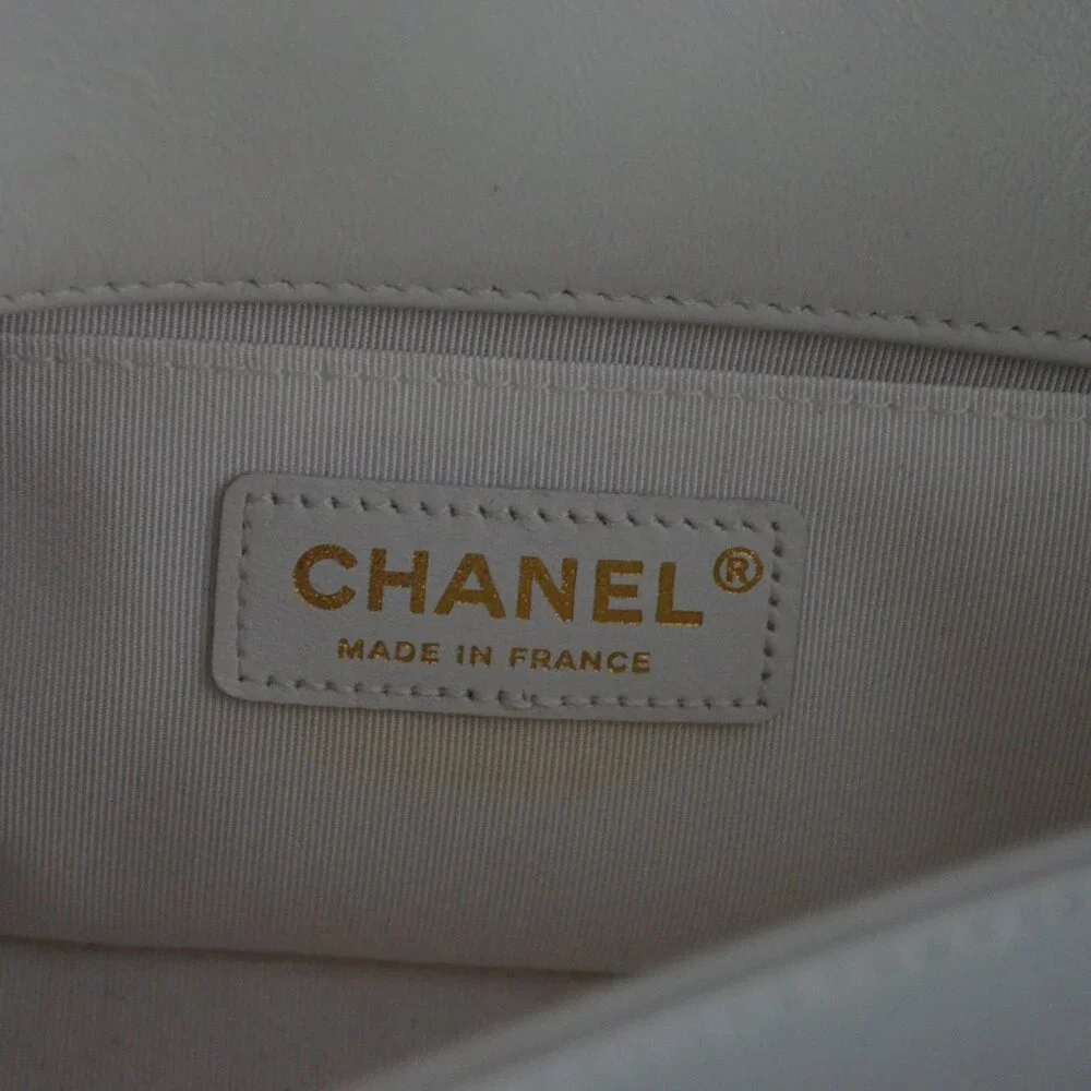 CHANEL white braided